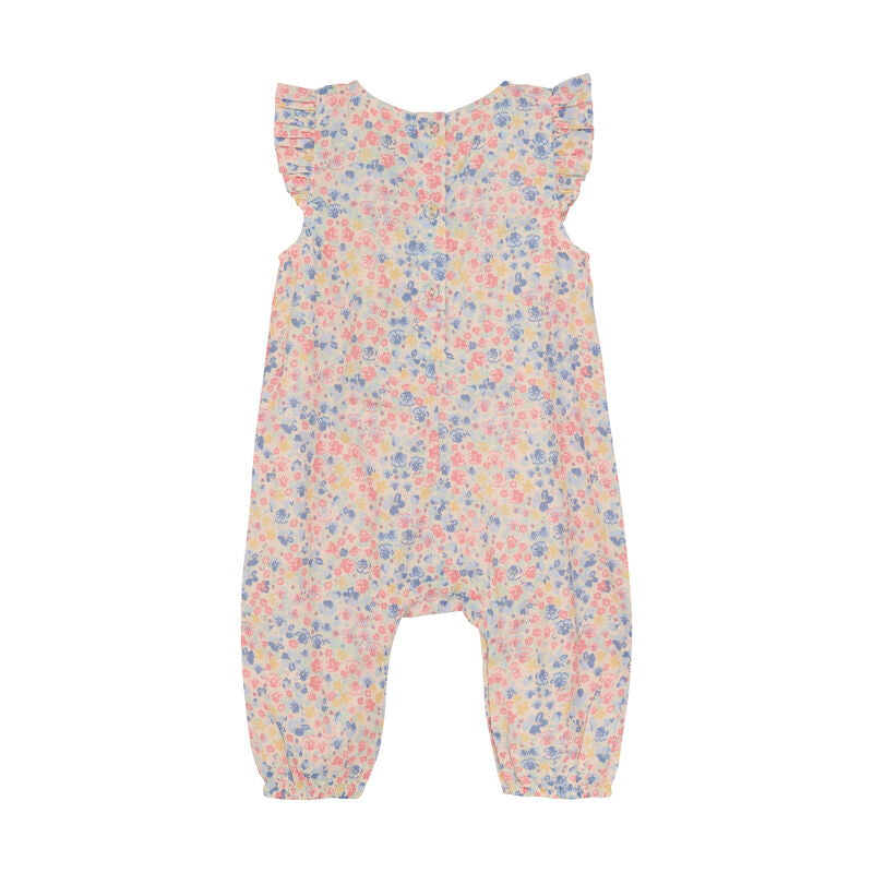 Rückansicht des Minymo Overalls mit floralem Allover-Print und weichem Baumwollstoff.